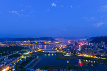The landscape of the city in the evening, in Chongqing, China, the Yangtze River passes through the city