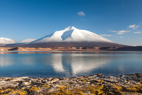 Fototapeta Mountain landscape with the Laguna Verde in the Atacama Desert, Chile, Travel & Active Lifestyle concept adventure vacations outdoor