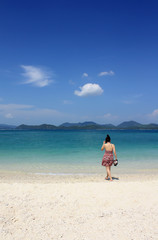 Relaxed woman on the beautiful beach