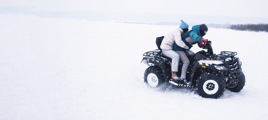 People in atv quad bike. Winter snow field © paulzhuk