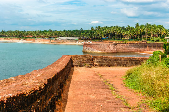 Aguada Fort. Ancient fortress on the shores of the Indian ocean. Goa. India. Vacation holidays travel background wallpaper