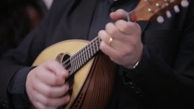 Mandolin an Italian man hands player