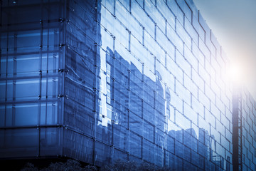 Glass walls of urban skyscrapers