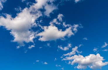 Naklejka na ściany i meble Beautiful blue sky with white clouds as background