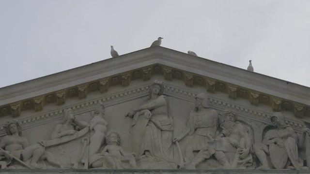 Adorned pediment and birds