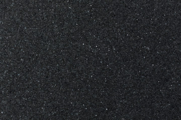 Natural black granite background.