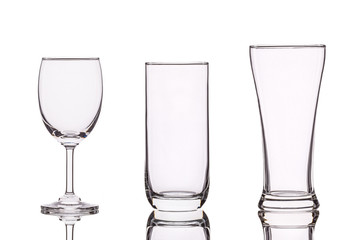 Different of empty clear drinking glass. Studio shot isolated on white