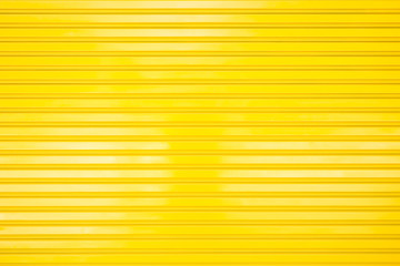 Yellow metal gate for texture and background