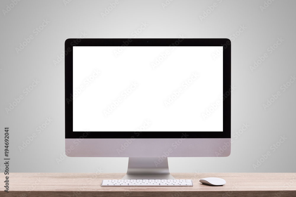 Aufkleber modern desktop computer on wooden table. studio shot isolated on blank grey. blank screen for graphi