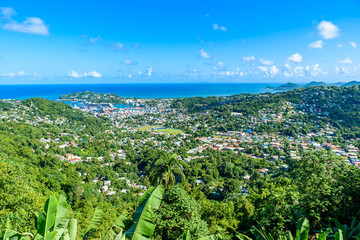 Castries, Saint Lucia - Tropical coast beach on the Caribbean island of St. Lucia. It is a paradise destination with a white sand beach and turquoiuse sea.