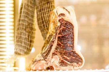Marbled beef steak rib eye in the fridge for dry maturation