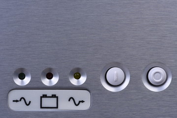 Buttons on uninterruptible power supply