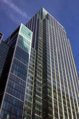Obraz na płótnie Canvas Skyscraper Business Office, blue sky background, Corporate building in London City, England, UK