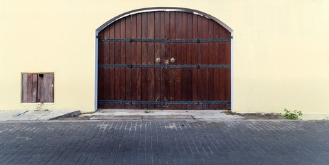 Fototapeta premium Old wooden brown house door