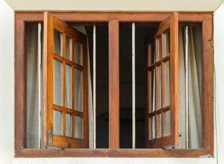 wooden house facade with Dark brown window