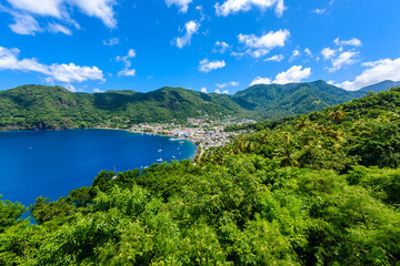 Fototapeta na wymiar Soufriere Village - tropical coast on the Caribbean island of St. Lucia. It is a paradise destination with a white sand beach and turquoiuse sea.