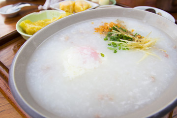 Porridge with dim sum on plate