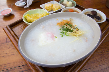 Porridge with dim sum on plate
