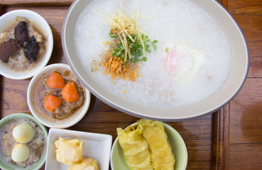Porridge with dim sum on plate
