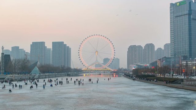 Time lapse of Tianjin skyline from day to night in winter