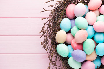 Naklejka na ściany i meble Easter colored eggs on the vintage background.