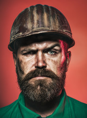 Architect, worker, engineer - work. Portrait bearded man with protect helmet wearing. Business, building, industry, technology - builder concept. Closeup portrait.