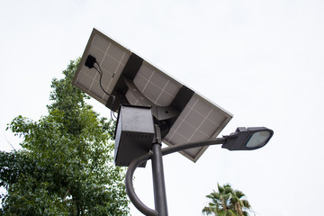 a solar panel and a street light