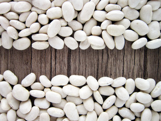 Fototapeta na wymiar on a wooden floor dry beans, grains.cereals.