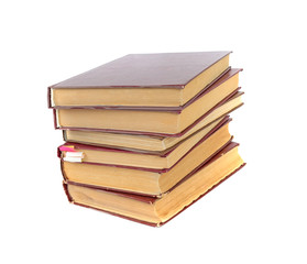 a stack of old books isolated on a white background