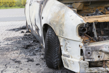 Fototapeta na wymiar burnt down car wreck