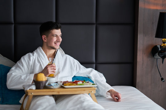 Breakfast in bed, cozy hotel room