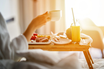 Breakfast in bed, cozy hotel room - 194705660