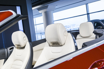 Modern Luxury car inside. Interior of prestige modern cabriolet car. Comfortable leather seats....