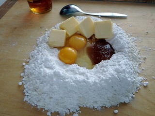 Baking cake ingredients - flour, sugar, eggs, honey, butter and rum