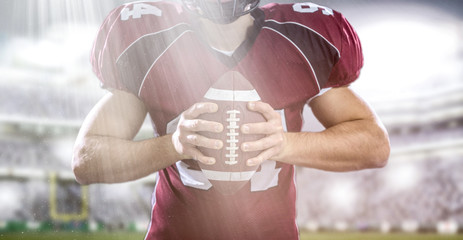 closeup American Football Player isolated on big modern stadium