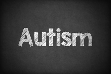 Obraz premium Autism on Textured Blackboard.