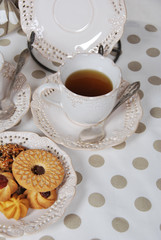 sweet cookies with black tea with sugar honey and vanilla