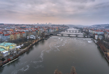 Czech Republic, Prague, panoramic city view with river Vltava and Charles Bridge.