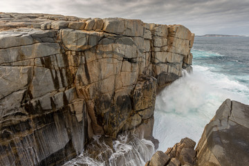 Waves crashing into The Gap in the Torndirrup National Park, Albany Western Australia