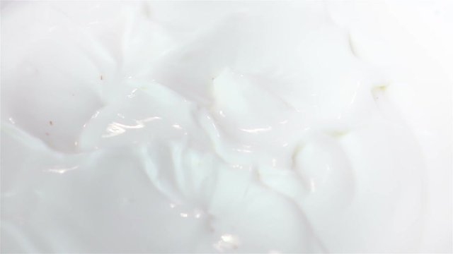 High quality video of strawberries falling into yogurt in real 1080p slow motion 250fps
