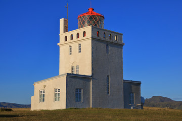 Lighthouse against a clear blue sky