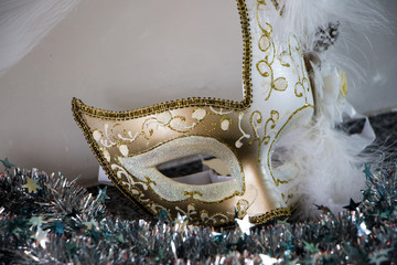white and gold venecian mask
