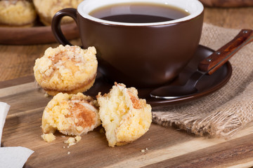 Cinnamon cream cheese coffee cake and cup of coffee