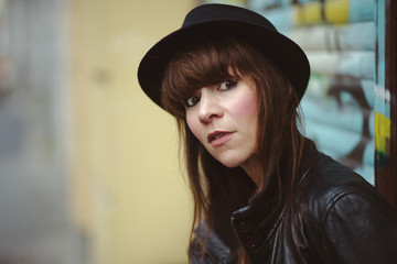 Curious woman with hat