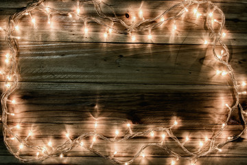 The garland lights on the table lined up in the middle frame, leaving space for the text.