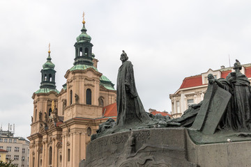 Jan Hus monument and at the background  St. Nikolaus Kirche