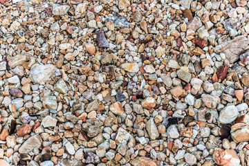 Sand and stone on the beach.Background and texture.