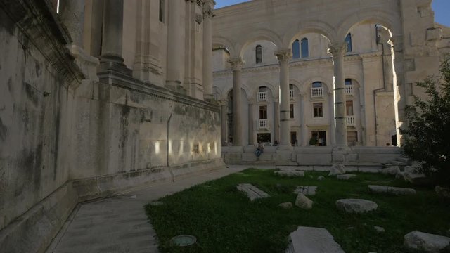 Peristyle arcades and columns at dusk