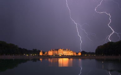 Naklejka na ściany i meble Castle Nordkirchen with lightning strikes, Germany