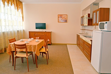 An interior of kitchen in warm colors 